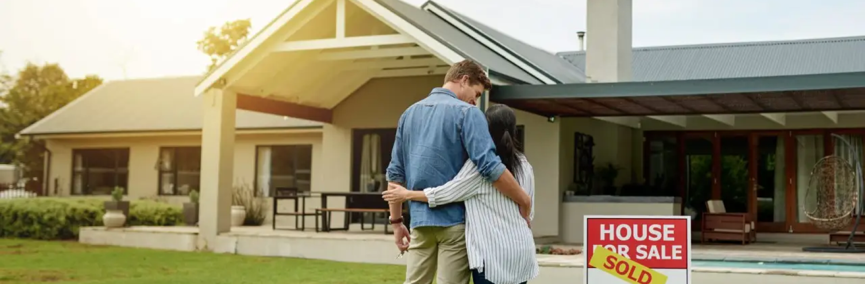 couple looking at house they just bought